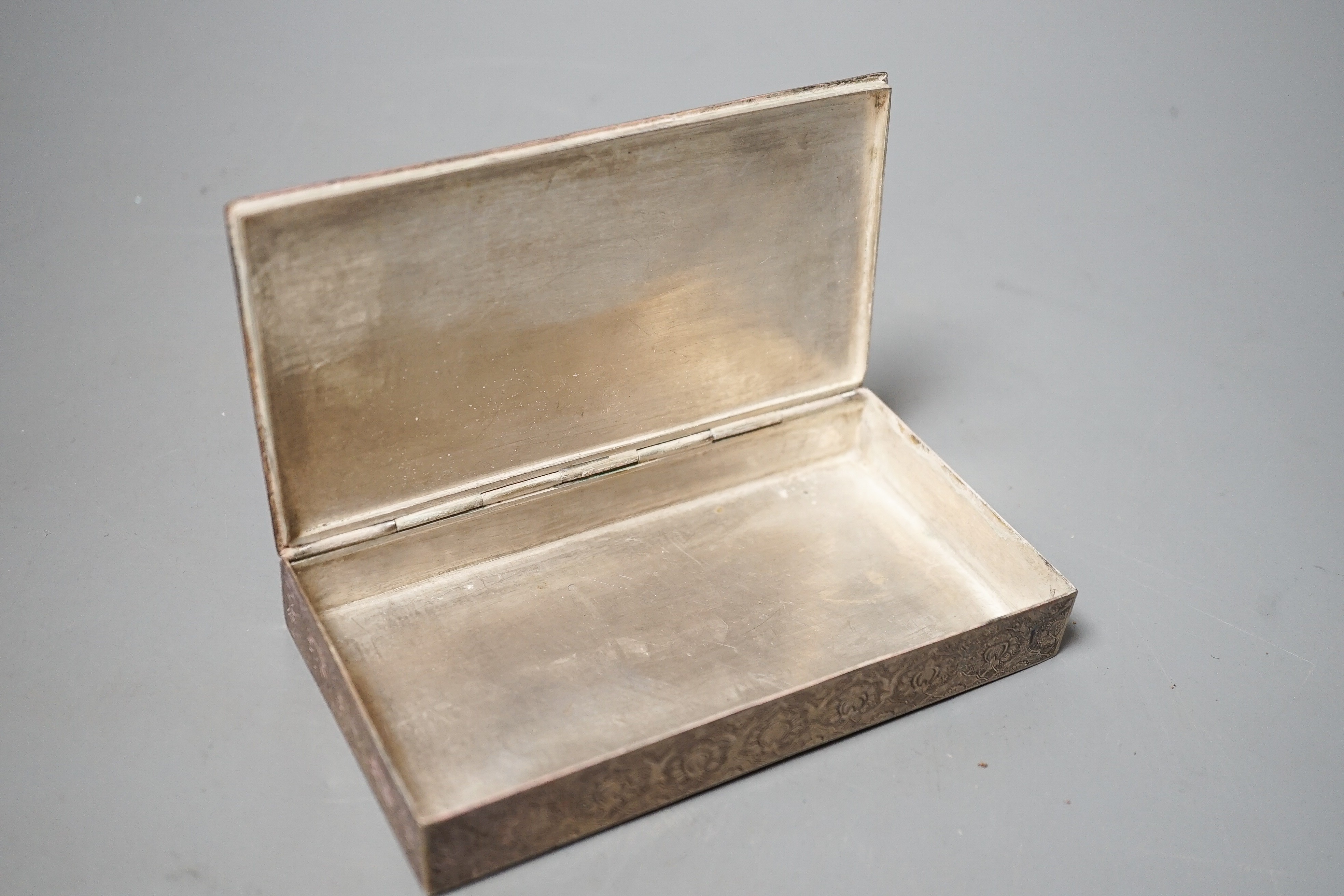 A Persian white metal box with inset miniature lid, 13.8cm.